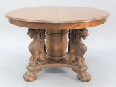 ROUND OAK DINING TABLE HAVING