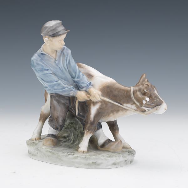 ROYAL COPENHAGEN BOY WITH CALF