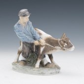 ROYAL COPENHAGEN BOY WITH CALF