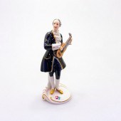 ROYAL DUX FIGURINE, MAN PLAYIN