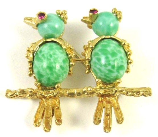 RUBY AND EIGHTEEN KARAT GOLD BROOCH