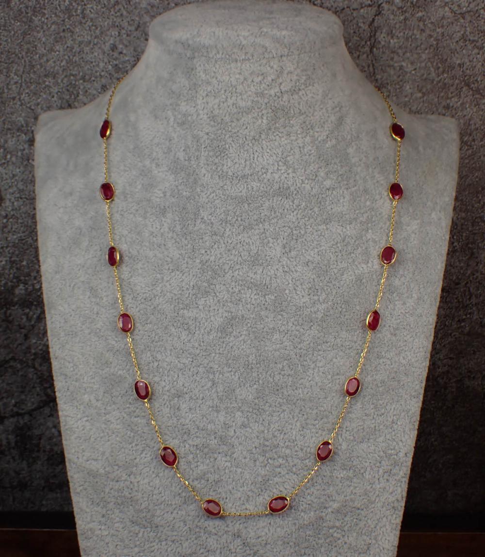 RUBY AND EIGHTEEN KARAT GOLD
