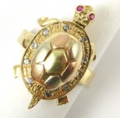 RUBY AND FOURTEEN KARAT GOLD T