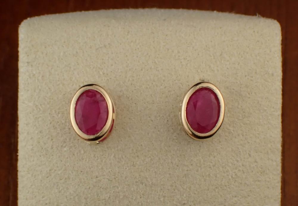 RUBY AND FOURTEEN KARAT GOLD EAR
