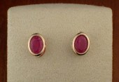 RUBY AND FOURTEEN KARAT GOLD E