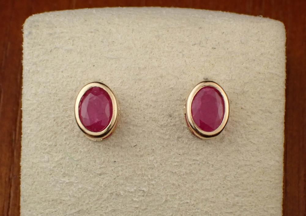 RUBY AND FOURTEEN KARAT GOLD EAR