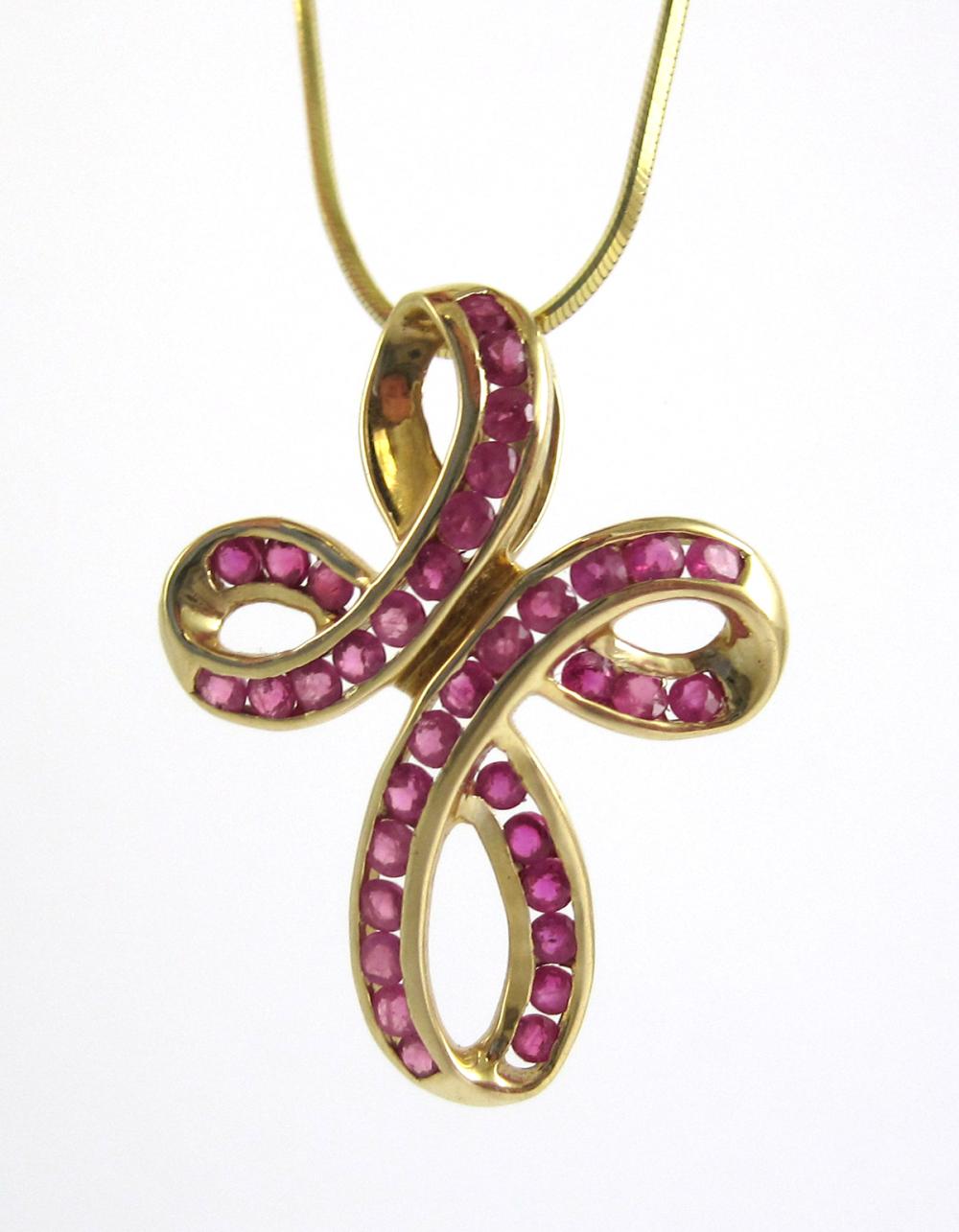 RUBY AND FOURTEEN KARAT GOLD