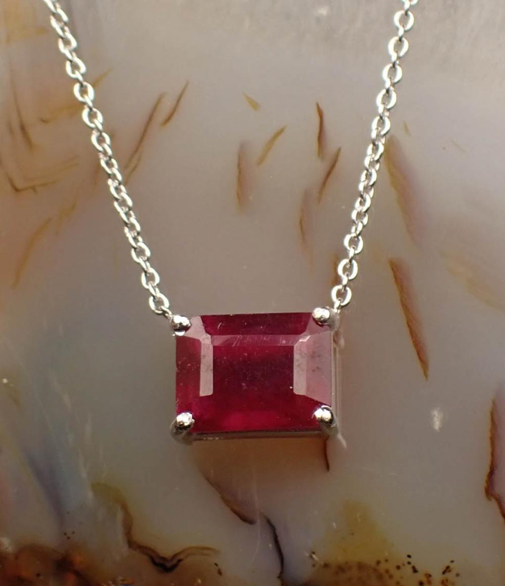RUBY AND FOURTEEN KARAT WHITE