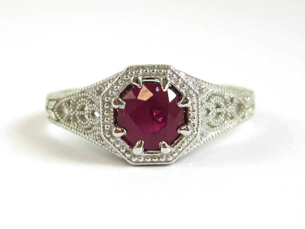 RUBY AND PLATINUM FILIGREE RING,