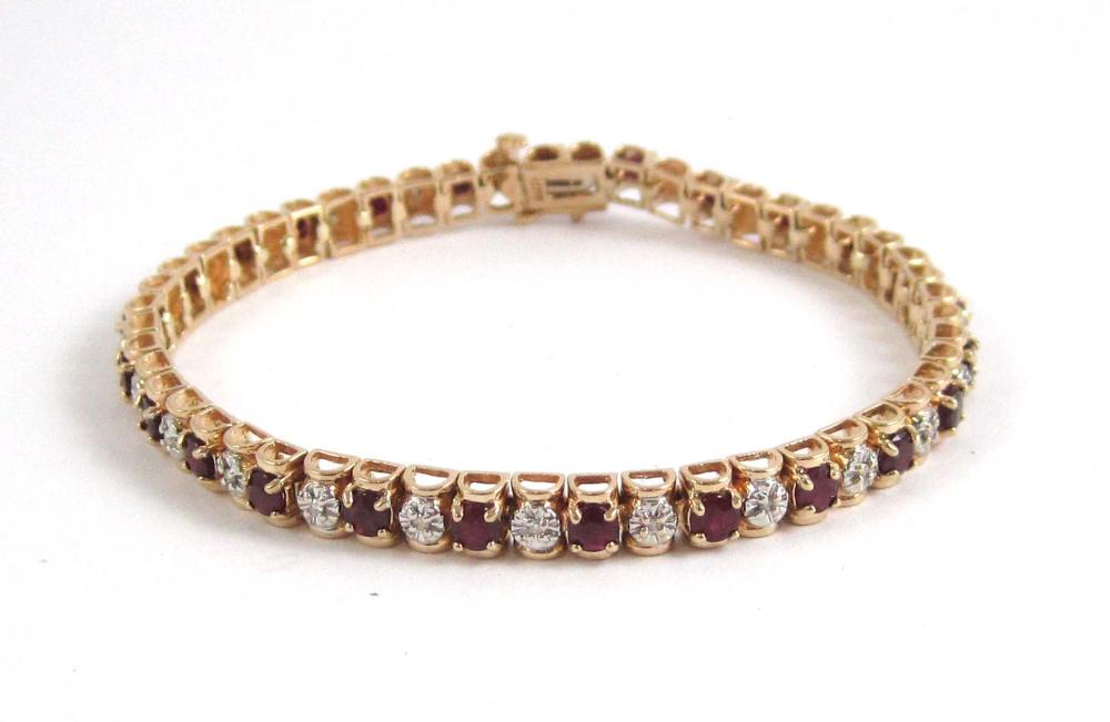 RUBY, DIAMOND AND TEN KARAT GOLD