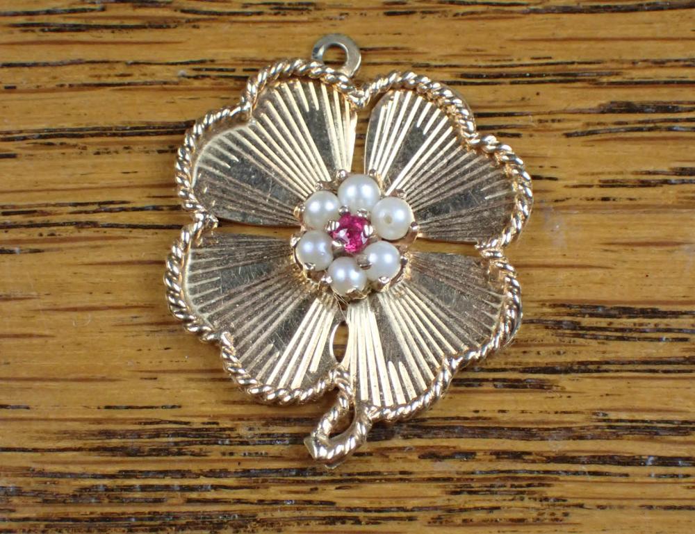 RUBY, SEED PEARL AND FOURTEEN KARAT