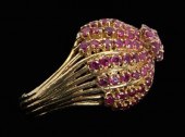 Ruby swirl form ring, 105 roun