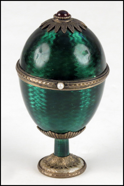 RUSSIAN ENAMEL EGG ON STAND. Hinged