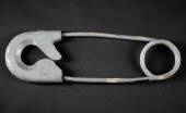 SAFETY PIN TRADE SIGNA carved
