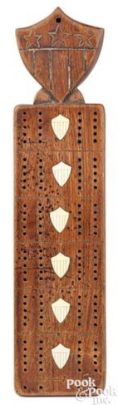 SAILOR'S CARVED MAHOGANY CRIBB