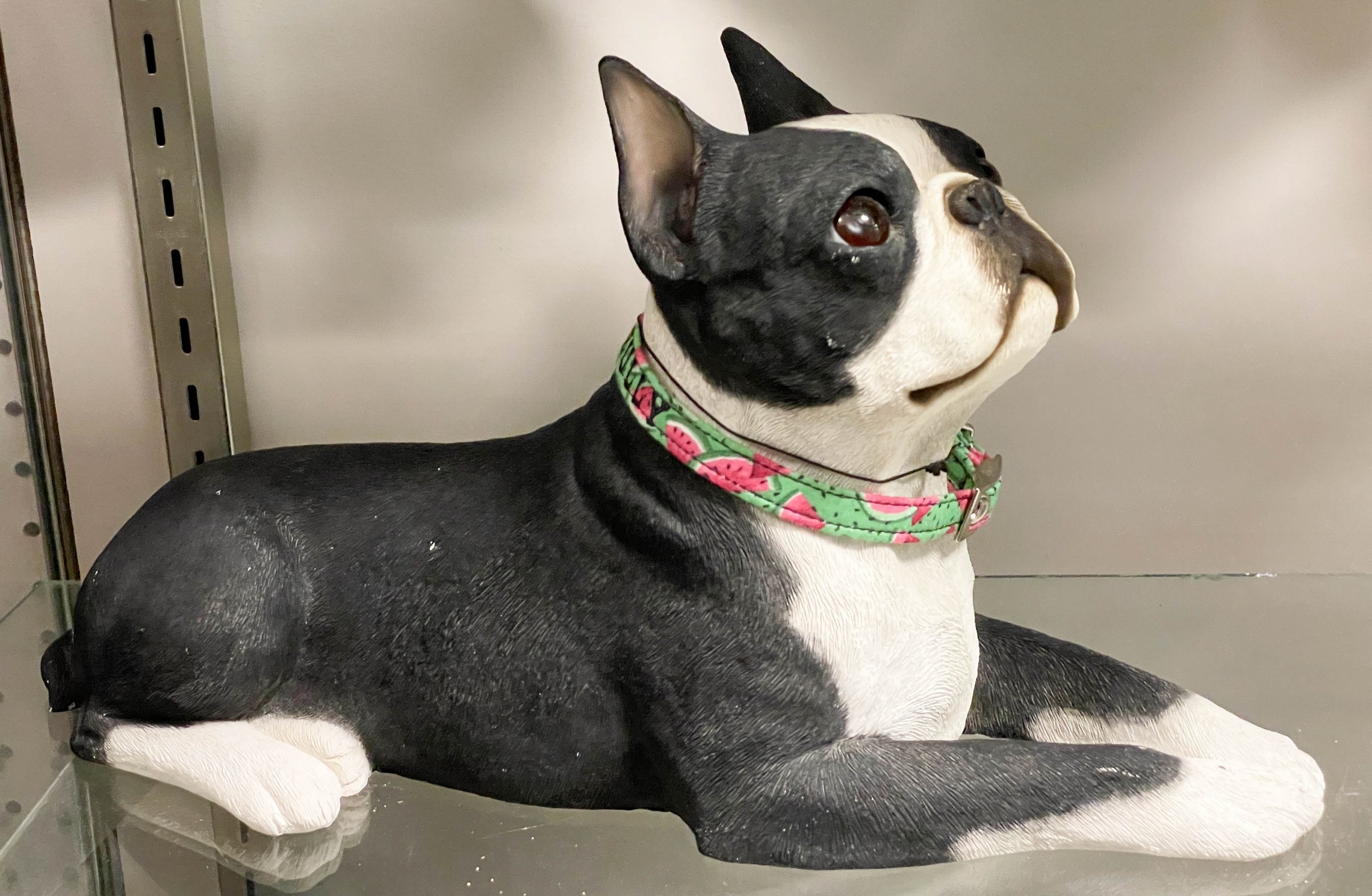 Sandicast dog figure, reclining