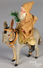 SANTA CLAUS RIDING A NODDING D
