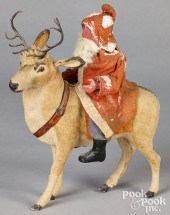 SANTA CLAUS RIDING A REINDEER