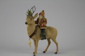 SANTA RIDING REINDEER CANDY CO