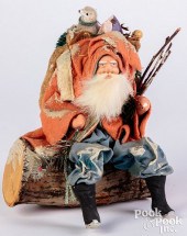 SANTA SEATED ON LOG FIGURESant