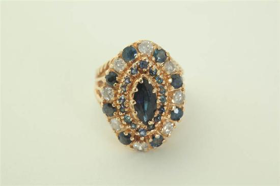 SAPPHIRE  GOLD AND DIAMOND RING.