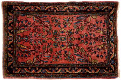Sarouk mat, tree and floral designs