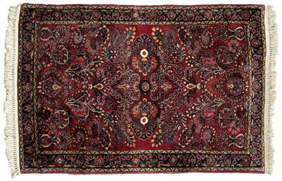 Sarouk rug, floral designs on