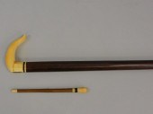 SCRIMSHAW CANE AND POINTER. 19