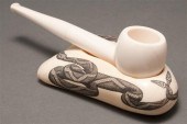 Scrimshaw rattlesnake decorate