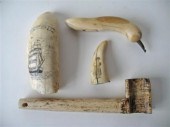 Scrimshawed teeth and two tool