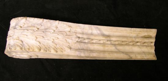 Scrolled and feather carved