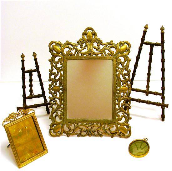 Scrolled brass easel framed mirror