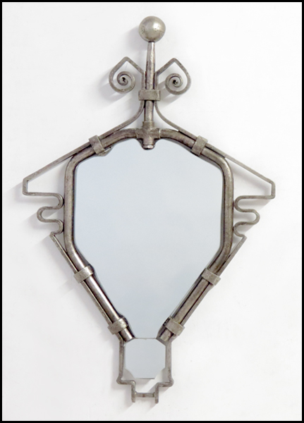 SCROLLED PATINATED IRON MIRROR.
