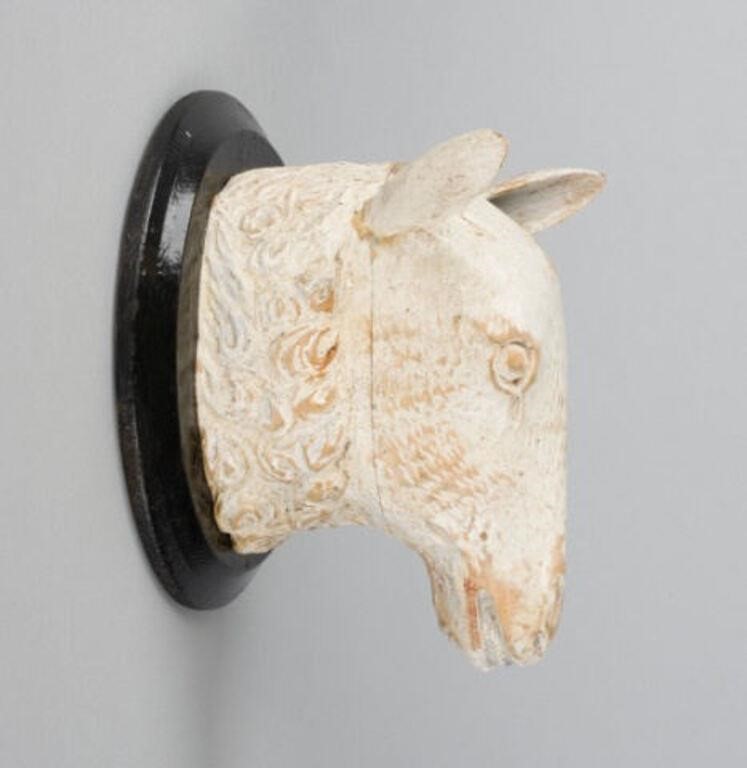 SCULPTED SHEEP HEADA wall-mounted