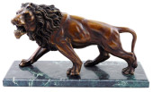 SCULPTURE: BRONZE LION IN THE