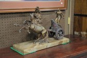 SCULPTURE OF A HORSE DRAWN CHA