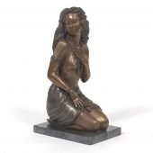 SCULPTURE OF A KNEELING WOMAN