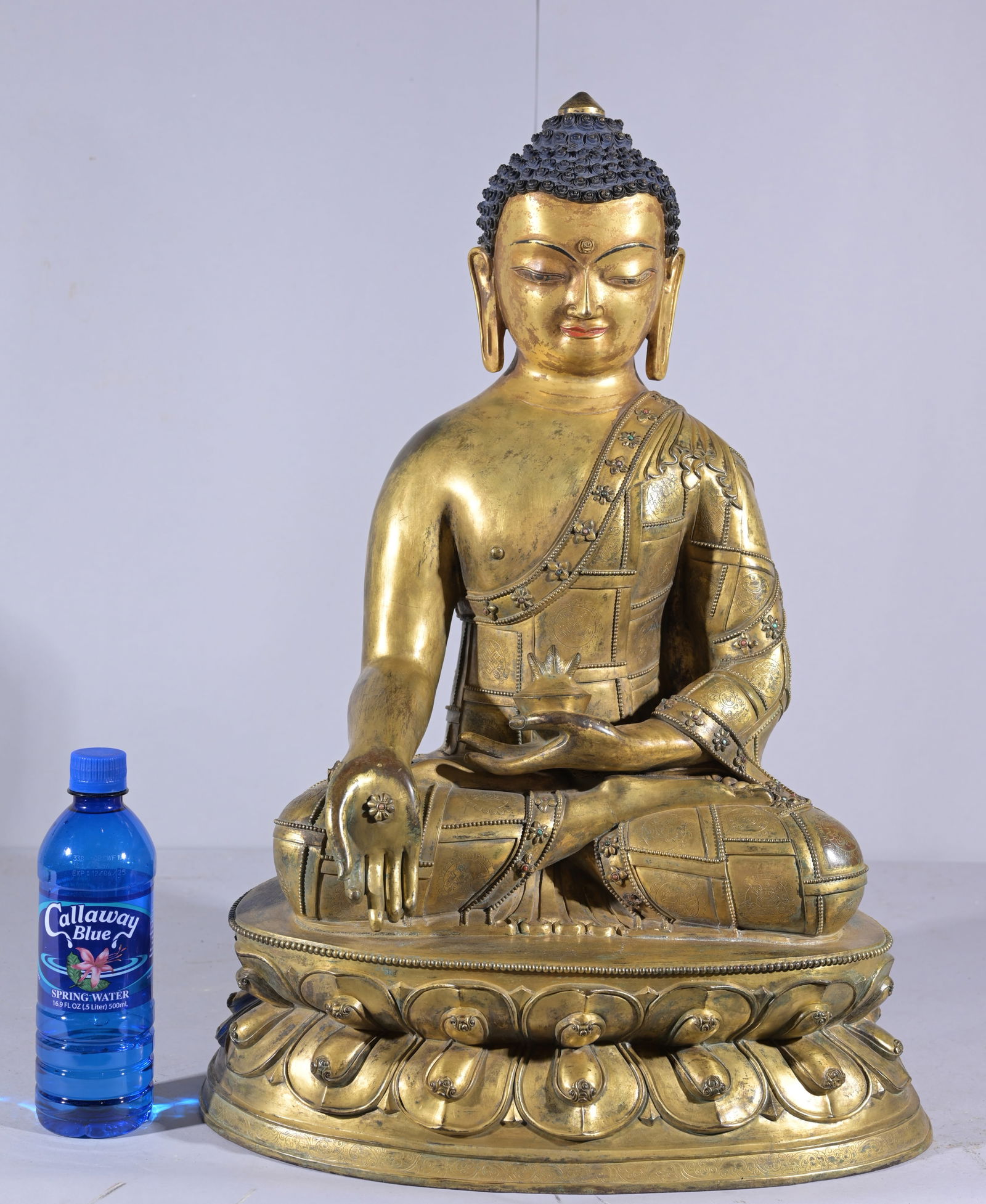 SEATED GILT BRONZE BUDDHA