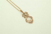 SEED PEARL PENDANT ON CHAIN.
