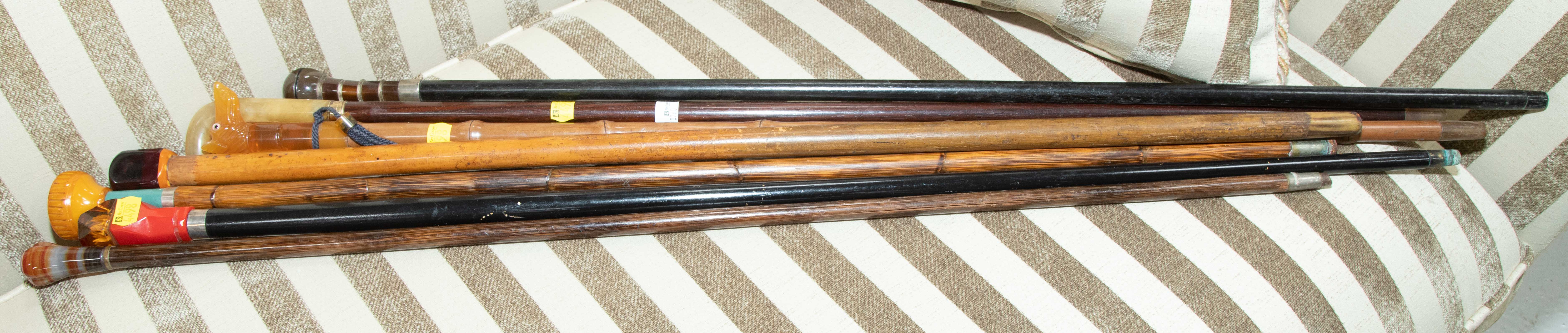 SELECTION OF SEVEN WALKING STICKS &
