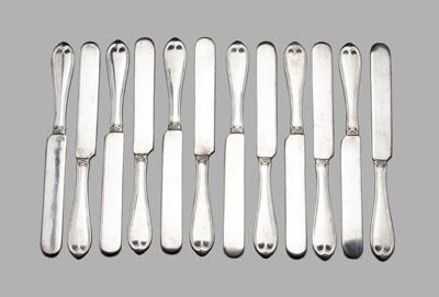 Set of 12 coin silver knives: