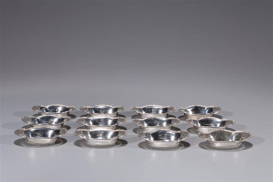 Set of 12 small sterling silver