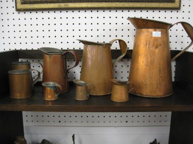 Set of 8 Copper Pitchers