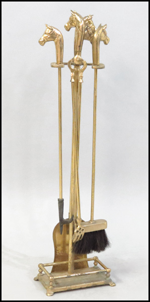 SET OF BRASS FIREPLACE TOOLS.