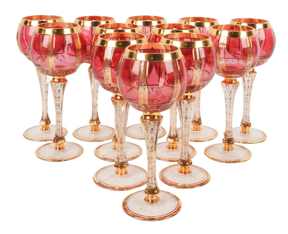 SET OF CRANBERRY AND GILT GLASS