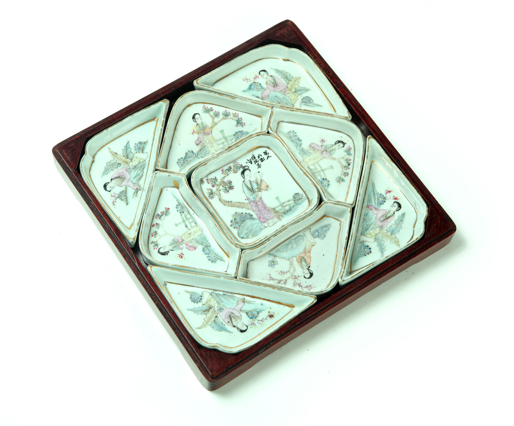 SET OF DISHES IN A WOODEN FRAME. 