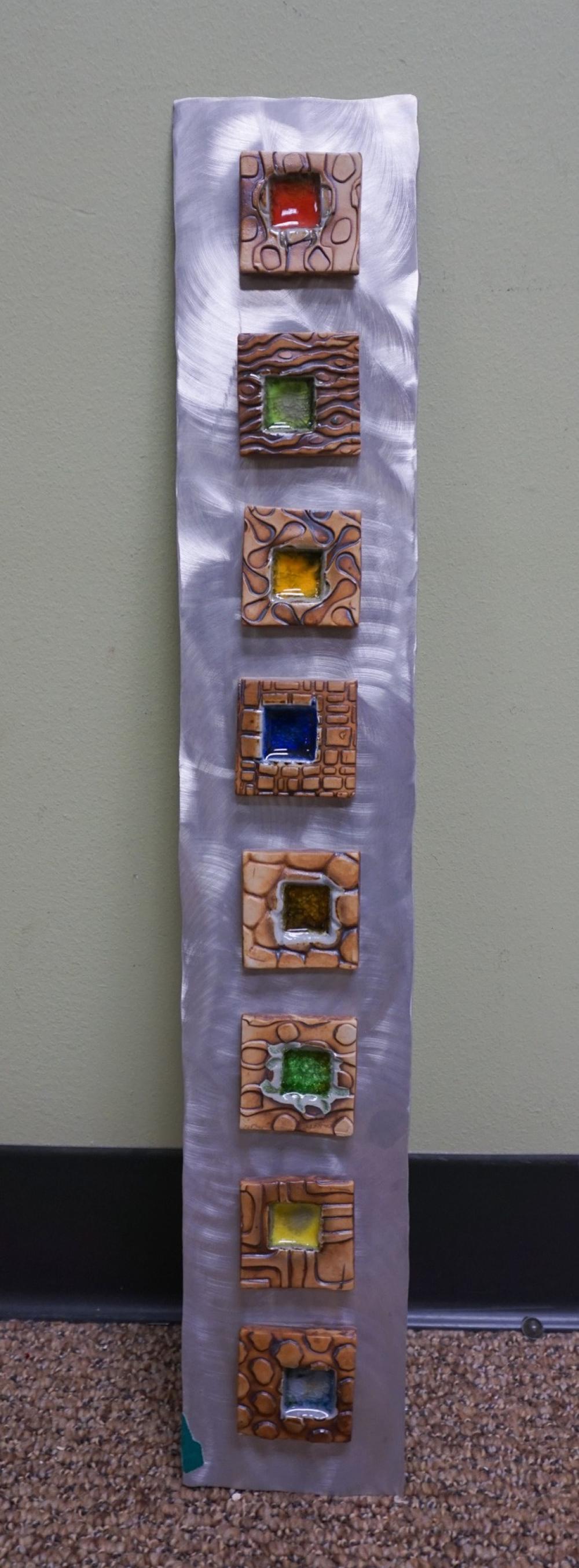 SET OF EIGHT GLAZED AND DECORATED