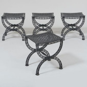 SET OF FOUR BLACK PAINTED CAST