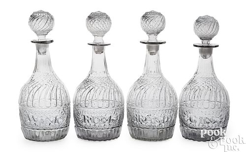 SET OF FOUR BLOWN CLEAR GLASS