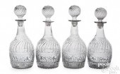 SET OF FOUR BLOWN CLEAR GLASS